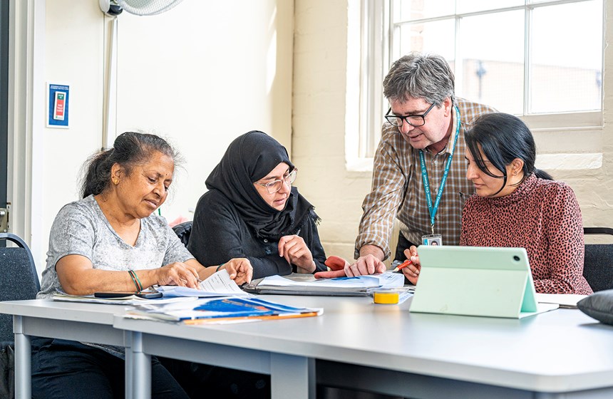 People learning skills and attending community training sessions